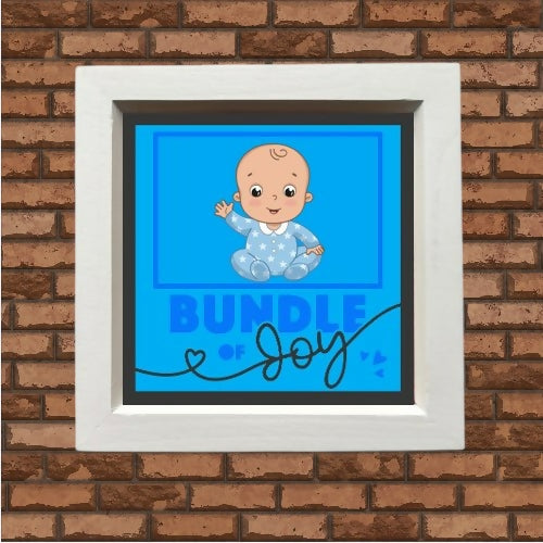 Bundle of joy boy brick background